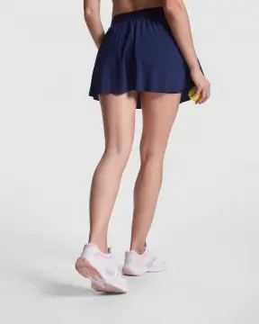 Serena - A lightweight and stretchy technical skirt for women made from recycled polyester.