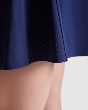 Serena - A lightweight and stretchy technical skirt for women made from recycled polyester.