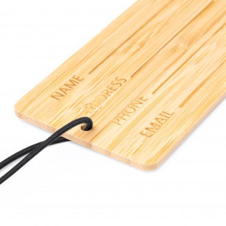 Kabore - Bamboo suitcase tag with black elastic strap.