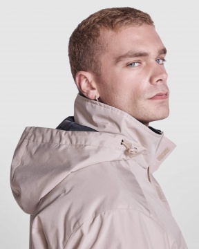 AMERICA - Waterproof jacket with quilted lining. High collar and retractable hood. 100% Recycled Polyester, 400g/m². 