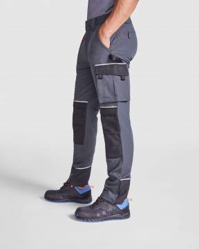 WALL - Flexible polyester work trousers with multiple pockets, weight: 260 g/m².