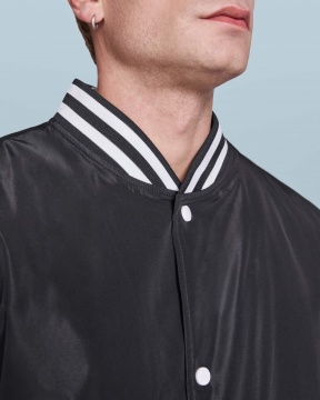 CALIFORNIA - Two-tone unisex jacket with quilted interior, zipper pockets and snap buttons.