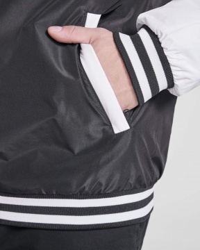 CALIFORNIA - Two-tone unisex jacket with quilted interior, zipper pockets and snap buttons.