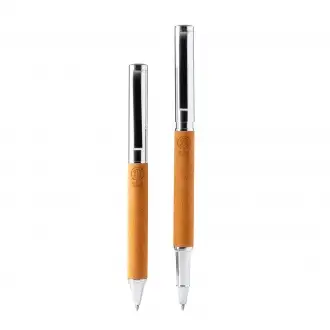 Tombol - A ballpoint and twist pen set with a main construction made of recycled leather, a twist mechanism and metal details.